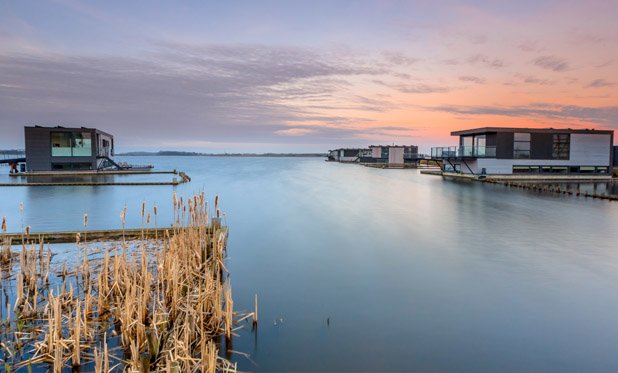 De strijd tegen het stijgende water met drijvende steden