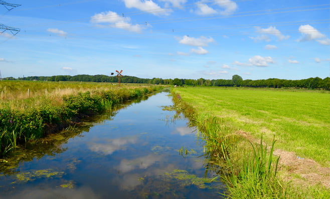 PBL Verander de bestemming van landbouwgrond in die voor woningen en natuur